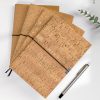 Eco-friendly cork journal book with elastic band closure and lined pages